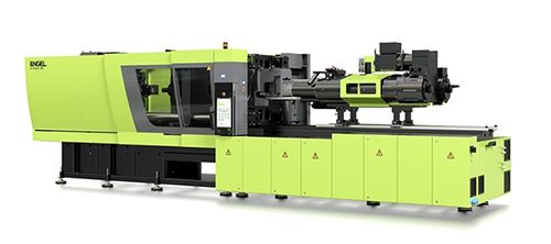ENGEL molding machine with an injection unit with two synchronized drives for the injection movement ENGEL molding machine with an injection unit with two synchronized drives for the injection movement