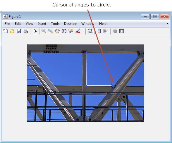 Image of crane trusses with a partially drawn polygon.